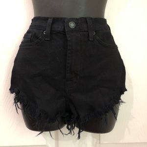 KANCAN Black high rise waist cut off shorts with raw distressed hem size 7